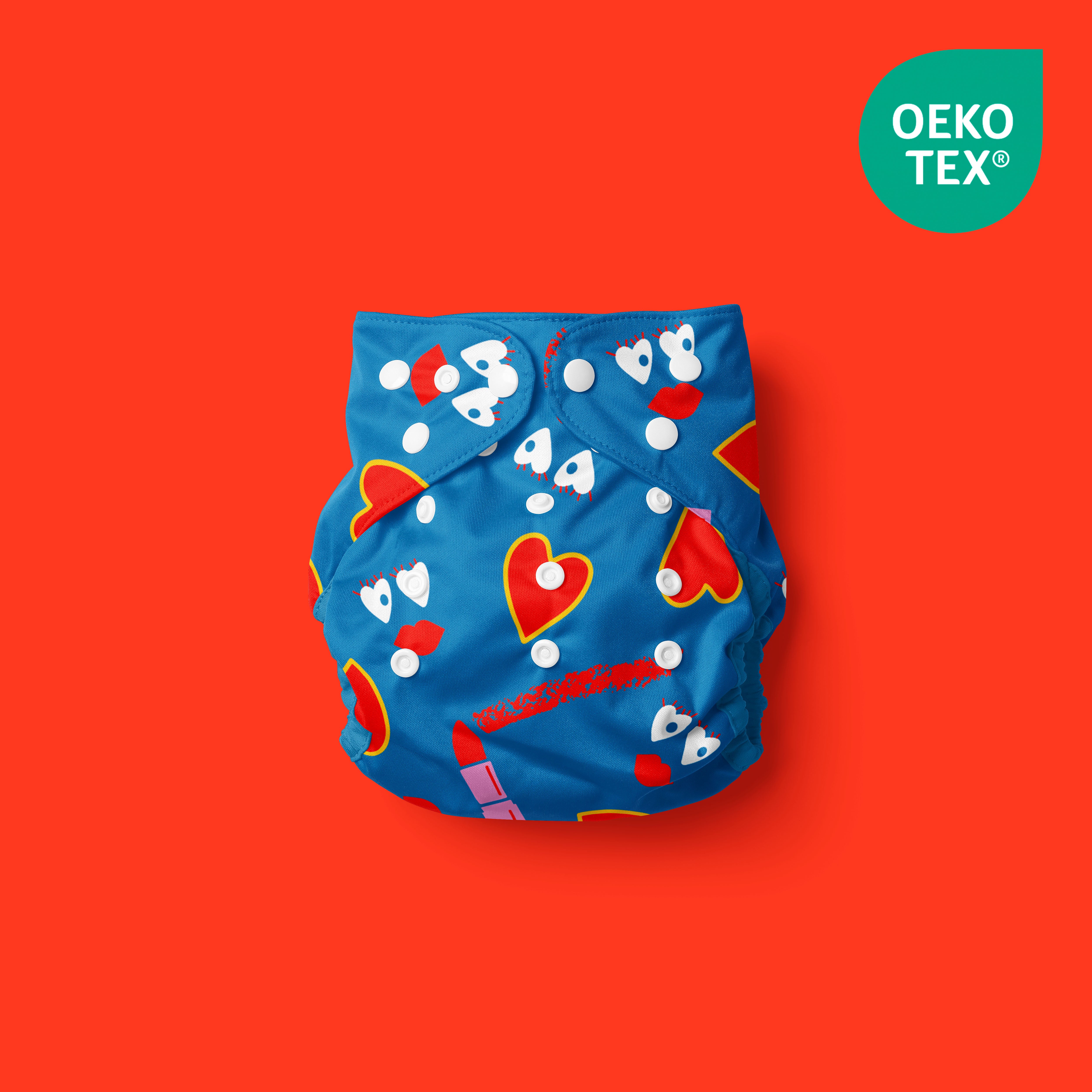 Pañal biodegradable, lavable y con motivos divertidos Poo and the lipstick - con fondo rojo