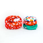 Descubre los accesorios unidos en el único Poo Rookie Pack - pañales reutilizables todo en uno, muy práctico en fondo blanco